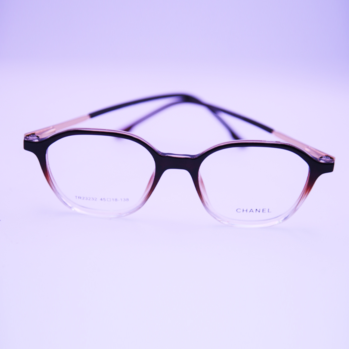 نظارة تشانيل (Chanel) طبية موديل 23232 بإطار كامل وشكل دائري انسيابي بلون بني دافئ متدرج يعكس الفخامة الفرنسية والرقي من تشكيلة متجر عين العون.